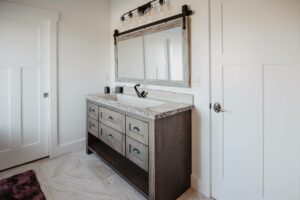 Bath vanity with marble top in custom home