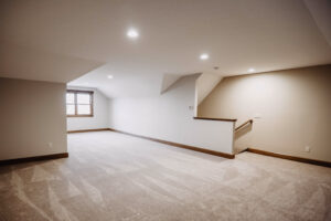 Bedroom with dormer in modern custom home built in western Ohio.