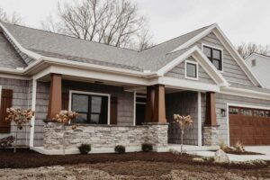 Modern custom home with shakes siding built in western Ohio.