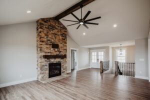 Great room with fireplace in new custom home located in western Ohio