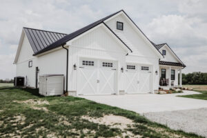 Garage with carriage doors on modern farmhouse style custom home built in Ohio