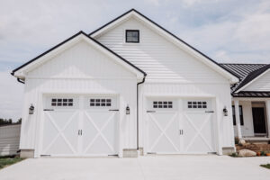 Garage with carriage doors on modern farmhouse style custom home built in Ohio