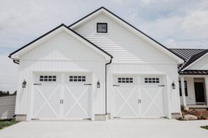 Garage with carriage doors on modern farmhouse style custom home built in Ohio
