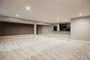 Finished basement with bar in custom home built in western Ohio.