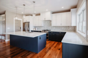 Navy blue and white kitchen in custom home.